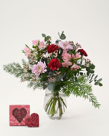 Kärlekshälsning med chokladhjärta