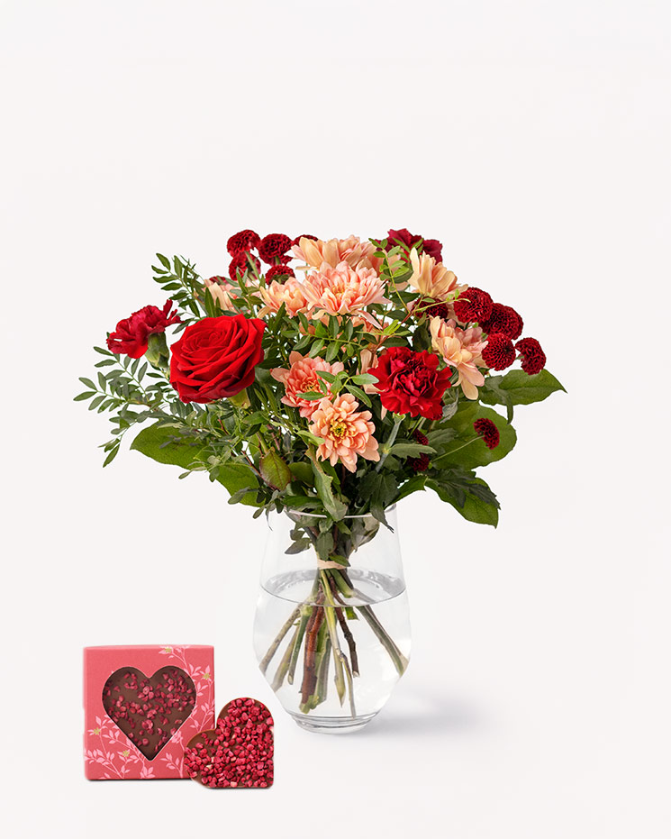 Varm hälsning med chokladhjärta